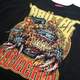 Illustration for article titled Prove Your Metal, Win a Kick-Ass Shirt